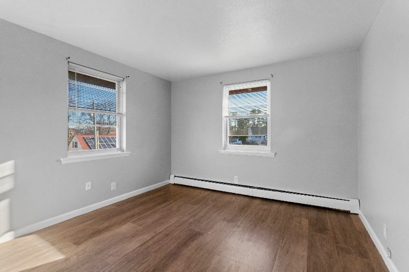 Bedroom with two windows