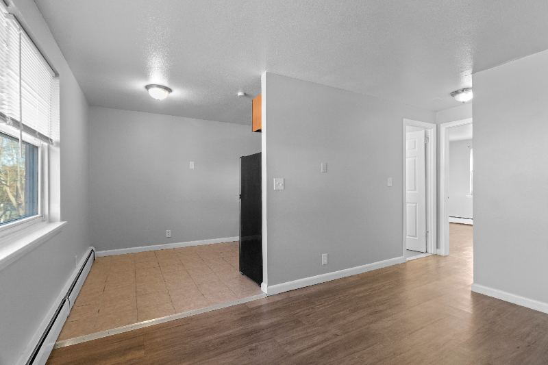 Living area with kitchen beyond