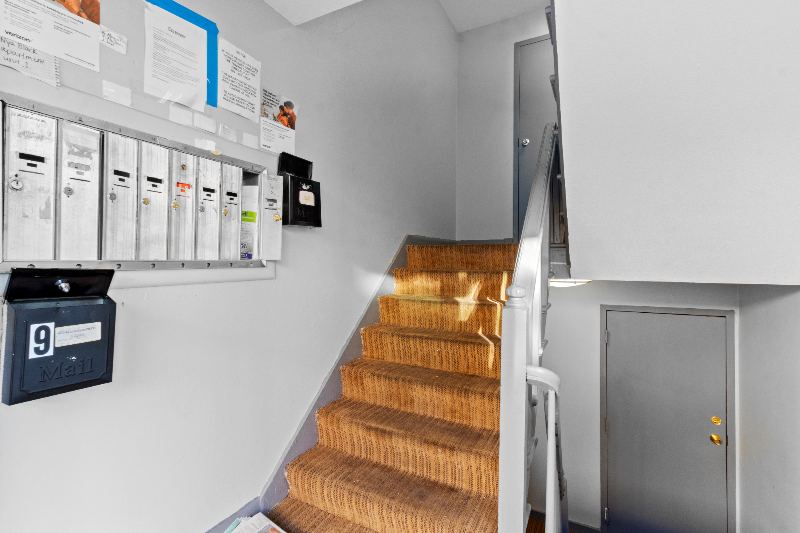 Entry stairwell and mailboxes